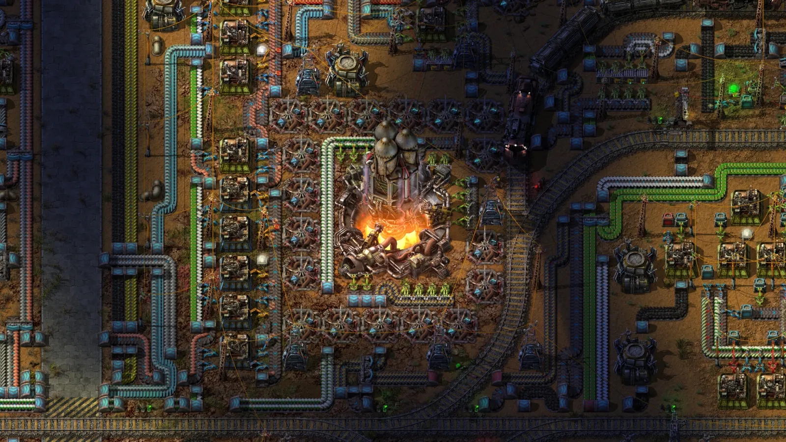 Linha de produção industrial em Factorio com esteiras cruzadas